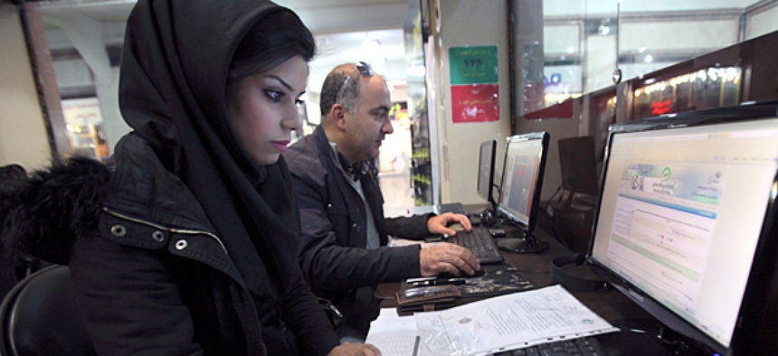 Iranians surf the web in an internet cafe at a shopping center, in central Tehran, Iran.