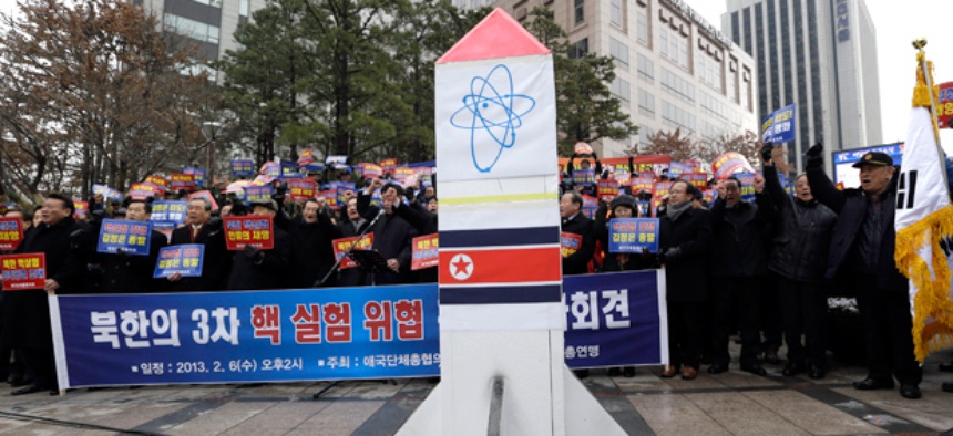 Anti-North Korea protesters shout slogans during a rally denouncing North Korea's possible third round of nuclear test in Seoul, South Korea.