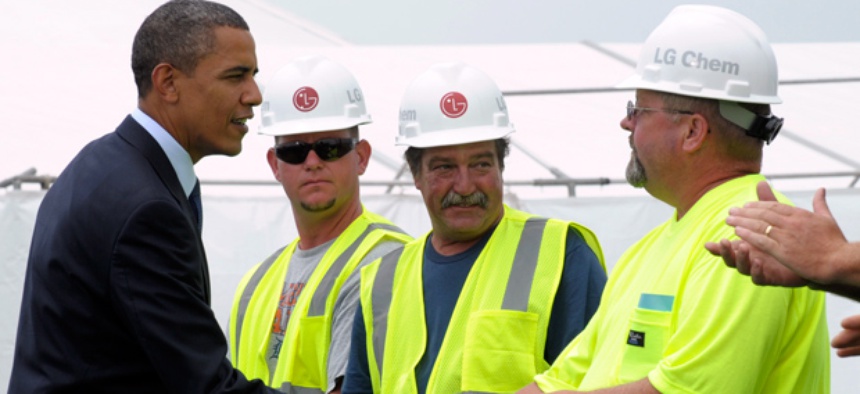 President Obama greets workers in 2010, at the groundbreaking ceremony at LG Chem Michgan Inc., then known as Compact Power Inc., a battery plant in Holland, Mich.