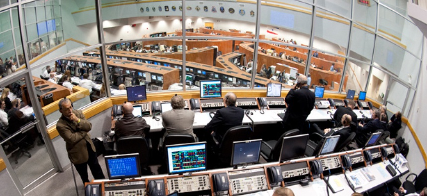 NASA mission managers work in Firing Room Four of the Launch Control Center at NASA Kennedy Space Center.