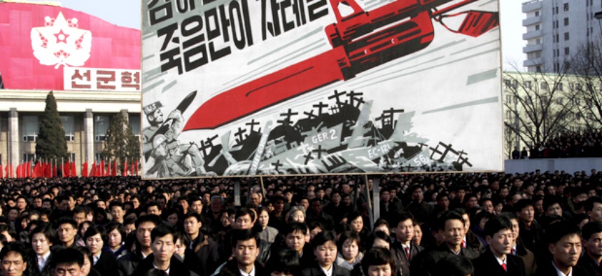 North Koreans attend a rally to support a statement given on Tuesday by a spokesman for the Supreme Command of the Korean People's Army vowing to cancel the 1953 cease-fire that ended the Korean War.