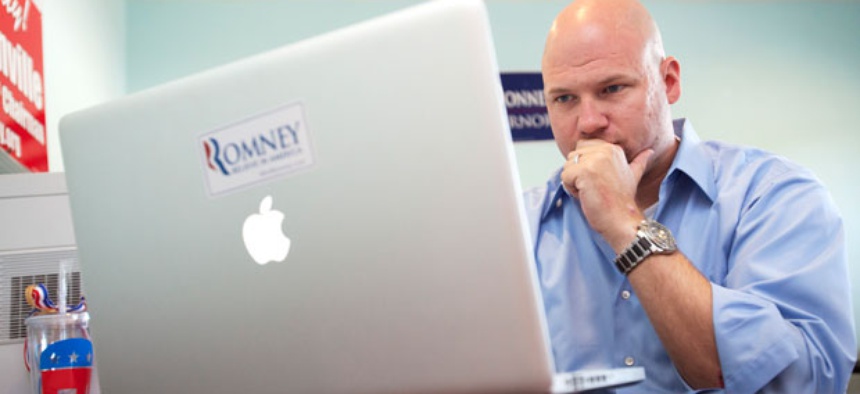 A Romney volunteer works on a campaign Facebook page in 2012.