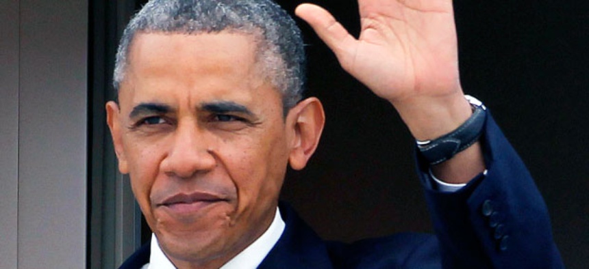President Barack Obama waves as he arrives at Los Angeles International Airport, Friday, June 7, 2013, to meet with the Chinese President Xi Jinping.