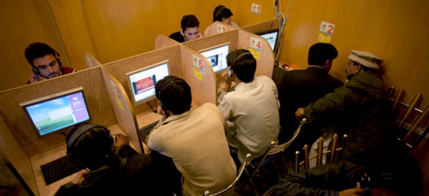 People use the Internet at a local cafe in Islamabad, Pakistan.
