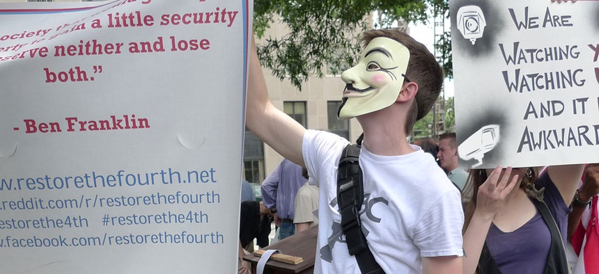 A protestor holds a sign in Washington Thursday.