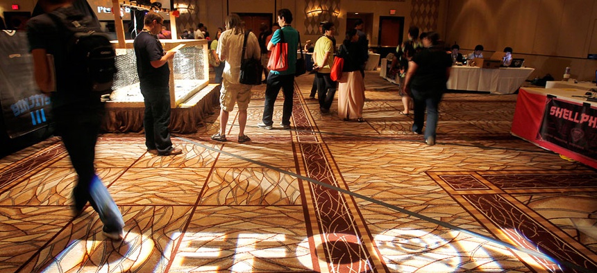 Hackers attend the DefCon conference 2011 in Las Vegas.