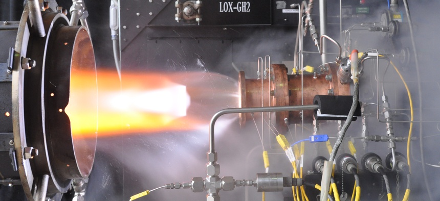 Rocket injector assembly built using additive manufacturing technology is hot-fire tested at NASA's Glenn Research Center.
