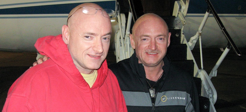 Expedition 26 Commander Scott Kelly, left, is reunited with his twin brother, Mark Kelly after 157 days on the International Space Station in March 2010.