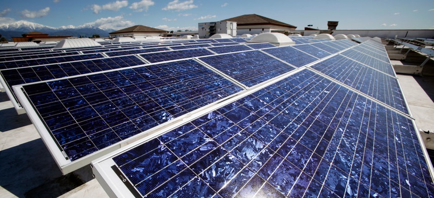 Solar panels are seen on the roof of a Wal-Mart Supercenter in Baldwin Park, California.