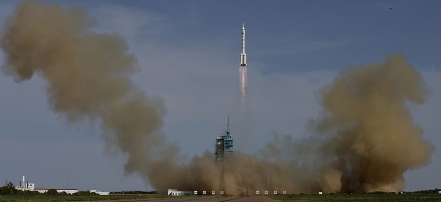 The Long March 2F rocket carrying the Shenzhou 10 capsule blasts off from the Jiuquan Satellite Launch Center Jiuquan in June.