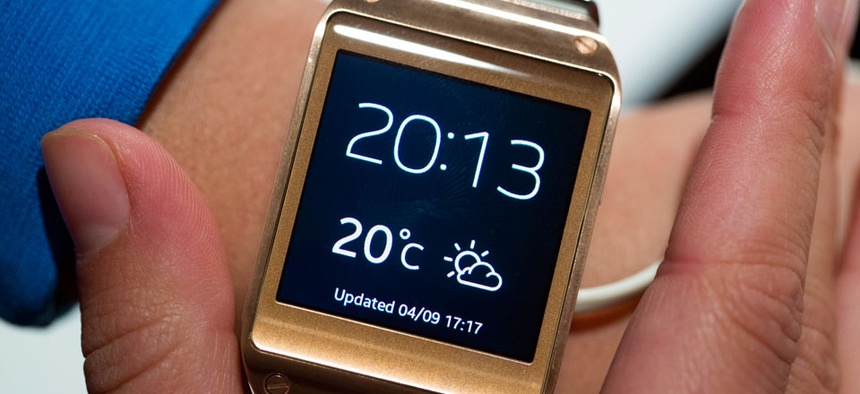 A model displays the new Samsung Galaxy Gear after a presentation in Berlin, Germany.