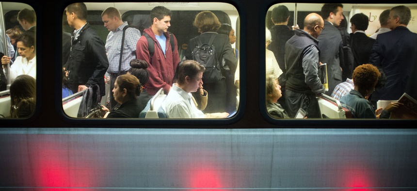 Passengers fill up Washington Metro subway cars in Arlington, Va.