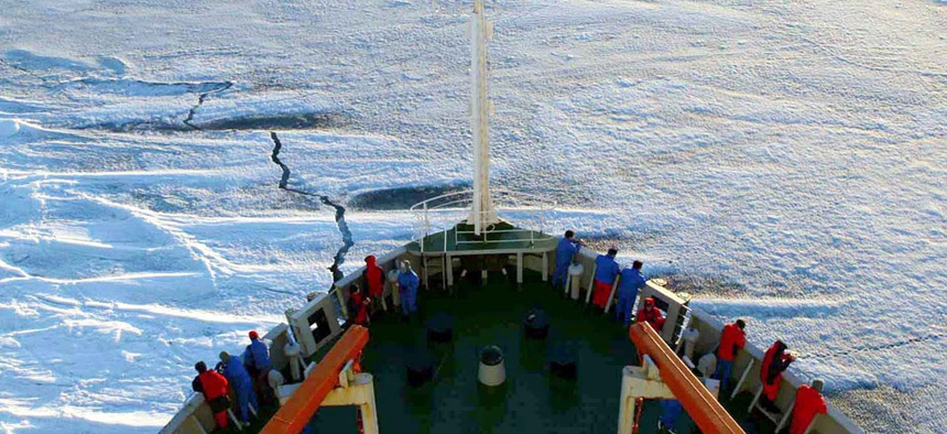 Members of the Chinese Antarctica Research Team wait for the arrival at the continent in 2005.