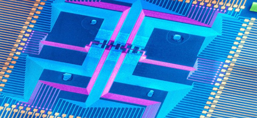 The DNA-sized nanowires in the center of this magnified chip could keep the electronics industry from burning out.