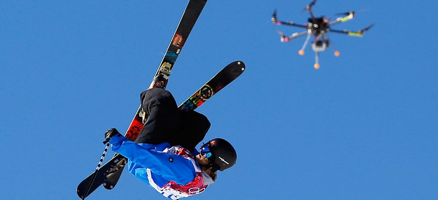 A drone camera follows Norway's Aleksander Aurdal during the men's ski slopestyle final at the 2014 Winter Olympics.