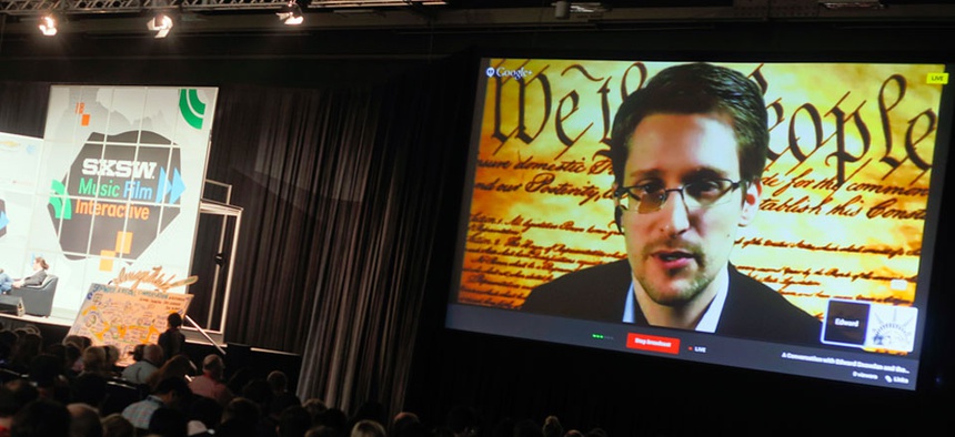 Edward Snowden talks during a simulcast conversation during the SXSW Interactive Festival on Monday, March 10, 2014.