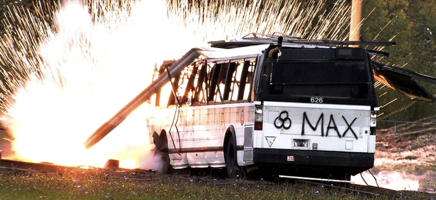 A simulated radioactive "dirty bomb" explodes on a bus which was used to test the ability of federal and local agencies to deal with a real terrorist attack.