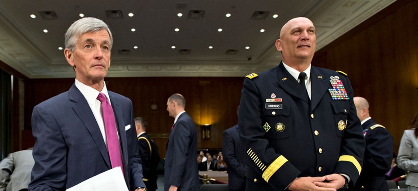Army Secretary John McHugh, left, and Army Chief of Staff Gen. Ray Odierno testified on Capitol Hill last year.