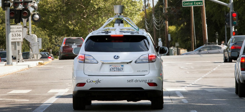 A Google driverless car navigating along a street in Mountain View, California.