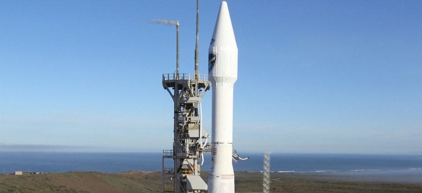 The Atlas V rocket carrying the Defense Meteorological Satellite Program-19 spacecraft Thursday April 3, 2014.