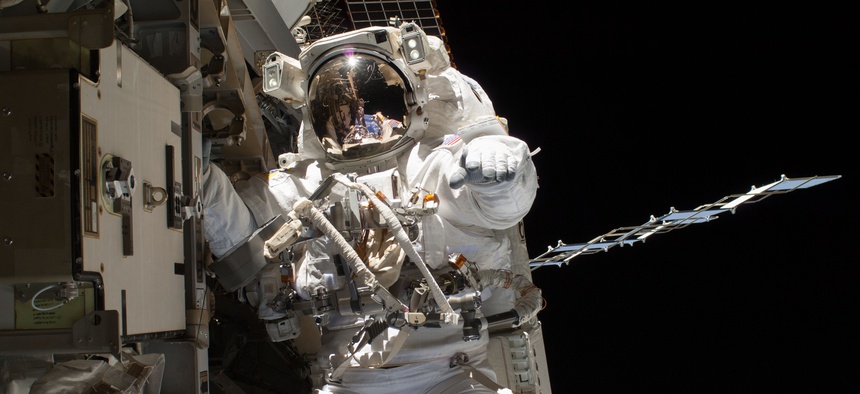 Astronaut Steve Swanson is pictured during a spacewalk on the International Space Station.