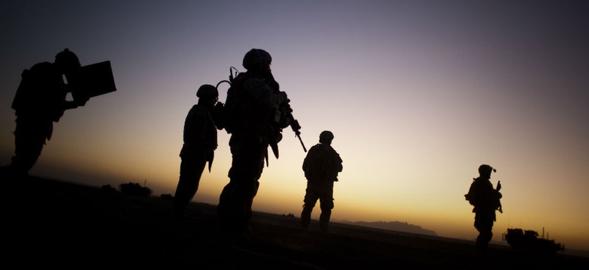 U.S. soldiers patrol the outskirts of Spin Boldak, near the border with Pakistan, about 100 kilometers (63 miles) southeast of Kandahar, Afghanistan.