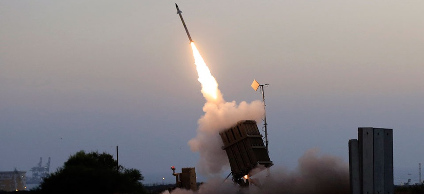 An Iron Dome air defense system fires to intercept a rocket from Gaza Strip in the costal city of Ashkelon, Israel.