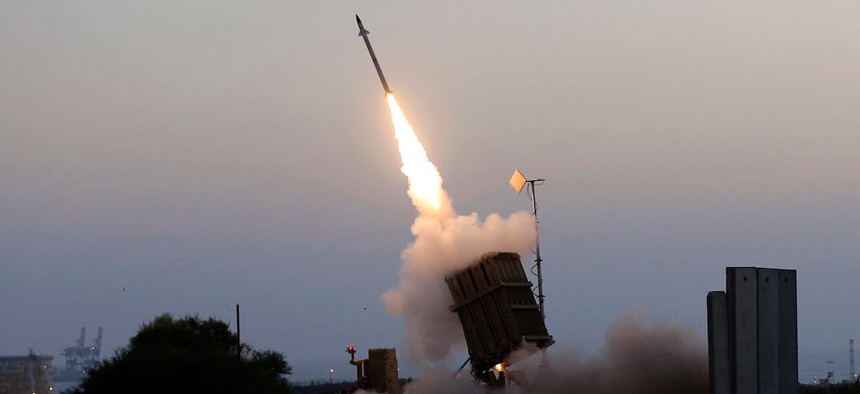 An Iron Dome air defense system fires to intercept a rocket from Gaza Strip in the costal city of Ashkelon, Israel.