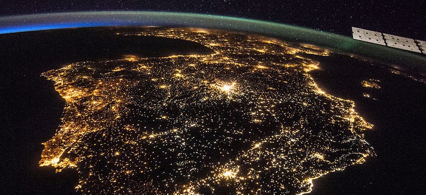 The Iberian Peninsula at night, showing Spain and Portugal. Madrid is the bright spot just above the center.