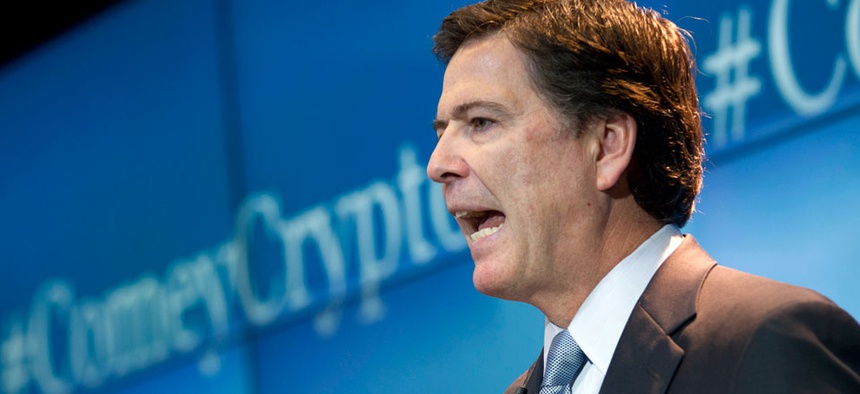 FBI Director James Comey speaks about the impact of technology on law enforcement, Thursday, Oct. 16, 2014, at Brookings Institution in Washington.