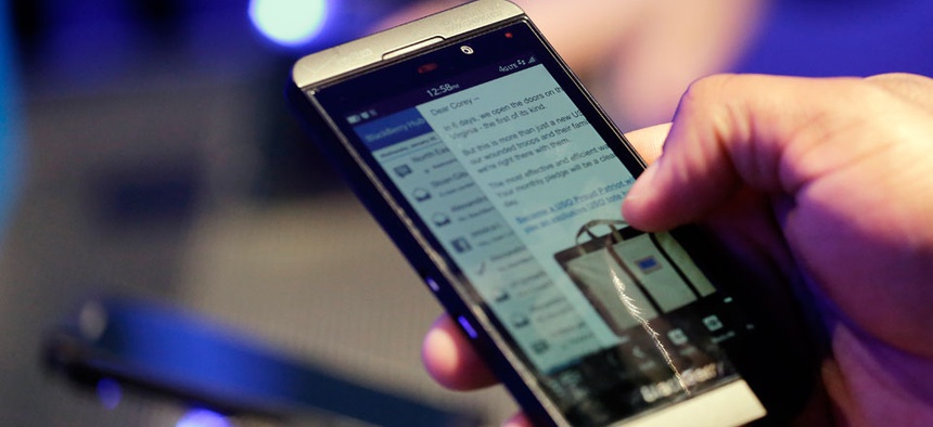 A person tries out the BlackBerry 10.