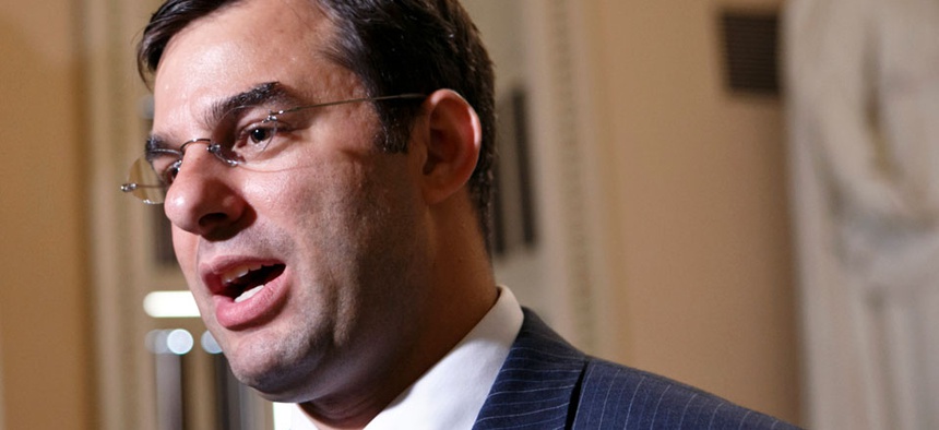 Rep. Justin Amash, R-Mich. speaks on Capitol Hill in Washington.