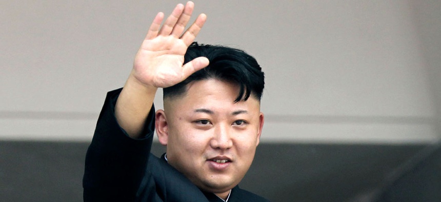 North Korean leader Kim Jong Un waves to spectators and participants of a mass military parade celebrating the 60th anniversary of the Korean War armistice in Pyongyang, North Korea.