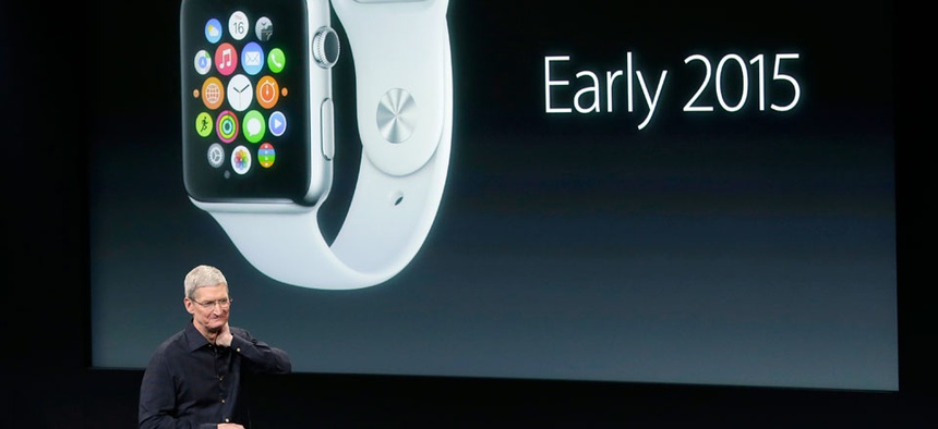 Apple CEO Tim Cook discusses the new Apple Watch during an event at Apple headquarters on Thursday, Oct. 16, 2014.