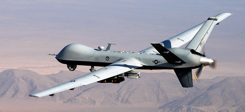A MQ-9 Reaper, armed with GBU-12 Paveway II laser guided munitions and AGM-114 Hellfire missiles, piloted by Col. Lex Turner during a combat mission over southern Afghanistan.
