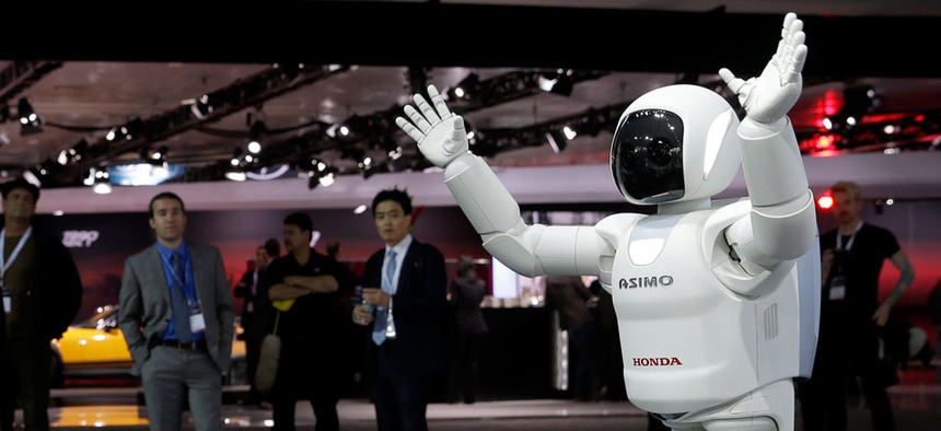 The Asimo Robot made by Honda is displayed at the New York International Auto Show.