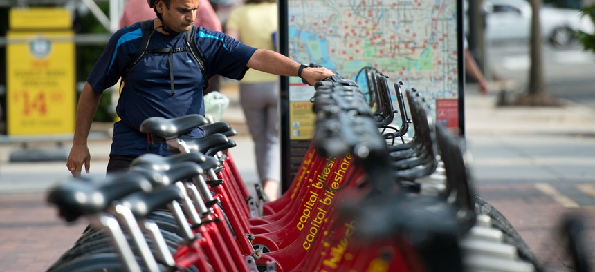 A rider picks out a bike at a Capital Bikeshare station in Washington, DC.