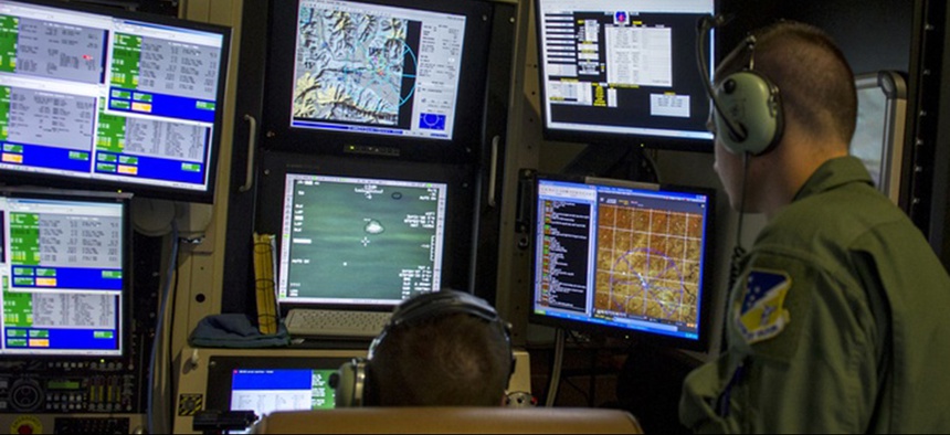 Student sensor operators from the 6th Reconnaissance Squadron practice tactical operations during an MQ-1 Predator simulator mission.