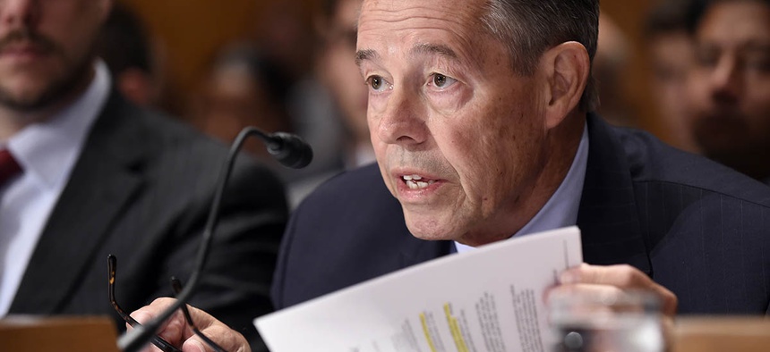 OPM Inspector General Patrick E. McFarland testifies on Capitol Hill in Washington.