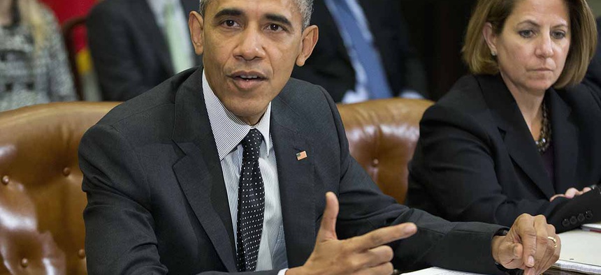 President Barack Obama meets with members of this national security team and cybersecurity advisers in the Roosevelt Room of the White House in Washington,Tuesday, Feb. 9, 2016.