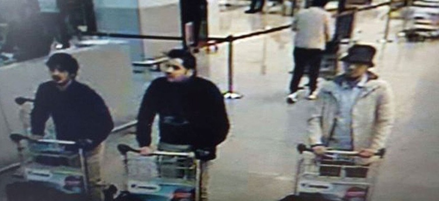 In this image provided by the Belgian Federal Police in Brussels on Tuesday, March 22, 2016, three men who are suspected of taking part in the attacks at Belgium's Zaventem Airport and are being sought by police.