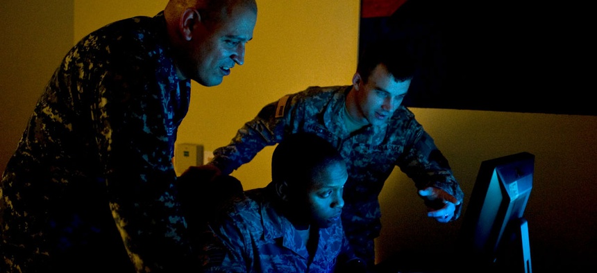 U.S. Navy Petty Officer 1st Class Joel Melendez, Naval Network Warfare Command information systems analysis, U.S. Air Force Staff Sgt. Rogerick Montgomery, U.S. Cyber Command network analysis, and U.S. Army Staff Sgt. Jacob Harding, 780th Military Intelli