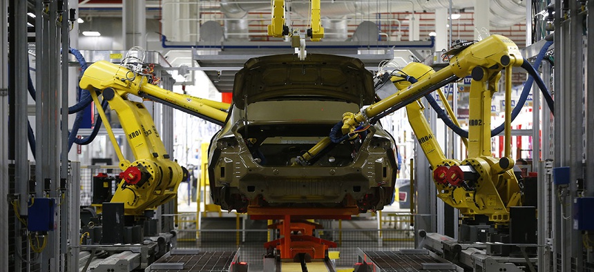 Automated robots build a 2015 Chrysler 200 at the Sterling Heights Assembly Plant in Sterling Heights, Mich.