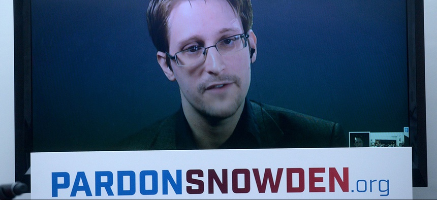 Edward Snowden speaks at the launch of a campaign calling on President Obama to pardon him.