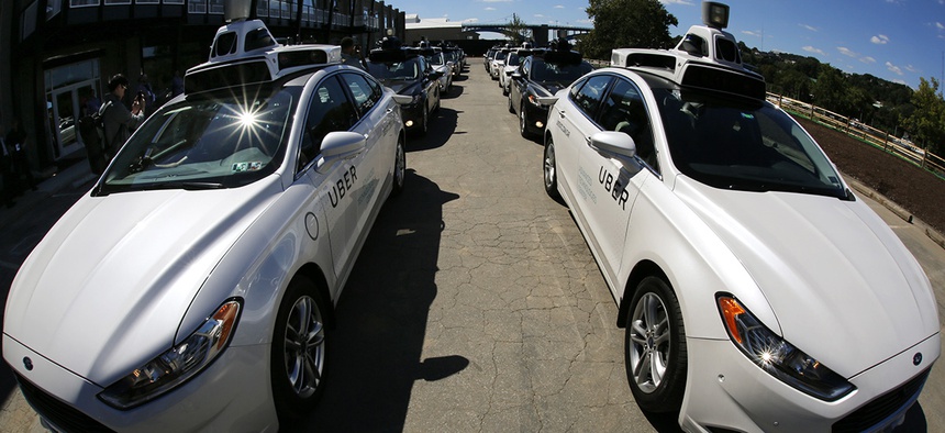 A group of self driving Uber vehicles