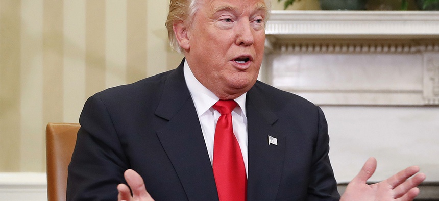 President-elect Donald Trump speaks during his meeting with President Barack Obama in the Oval Office of the White House in Washington.
