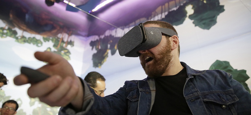 Dan Howley tries out the Google Daydream View virtual-reality headset and controller following a product event, Tuesday, Oct. 4, 2016.