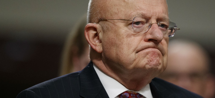 Director of National Intelligence James Clapper listens while testifying on Capitol Hill in Washington, Thursday, Jan. 5, 2017.