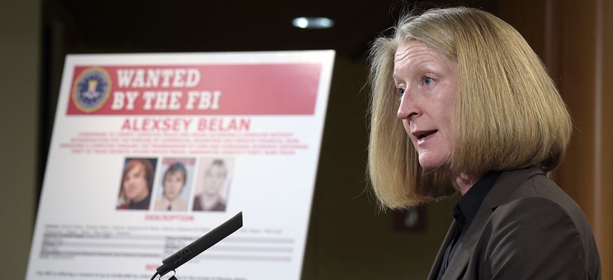 Acting Assistant Attorney General Mary McCord speaks during a news conference at the Justice Department in Washington, Wednesday, March 15, 2017.