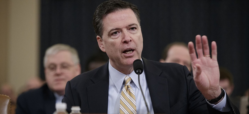 FBI Director James Comey testifies on Capitol Hill in Washington, Monday, March 20, 2017, before the House Intelligence Committee.